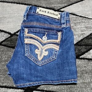 ROCK REVIVAL XIA EMBROIDERED IRIDESCENT SEQUIN FLEUR-DE-LIS MID-RISE DENIM SHORT